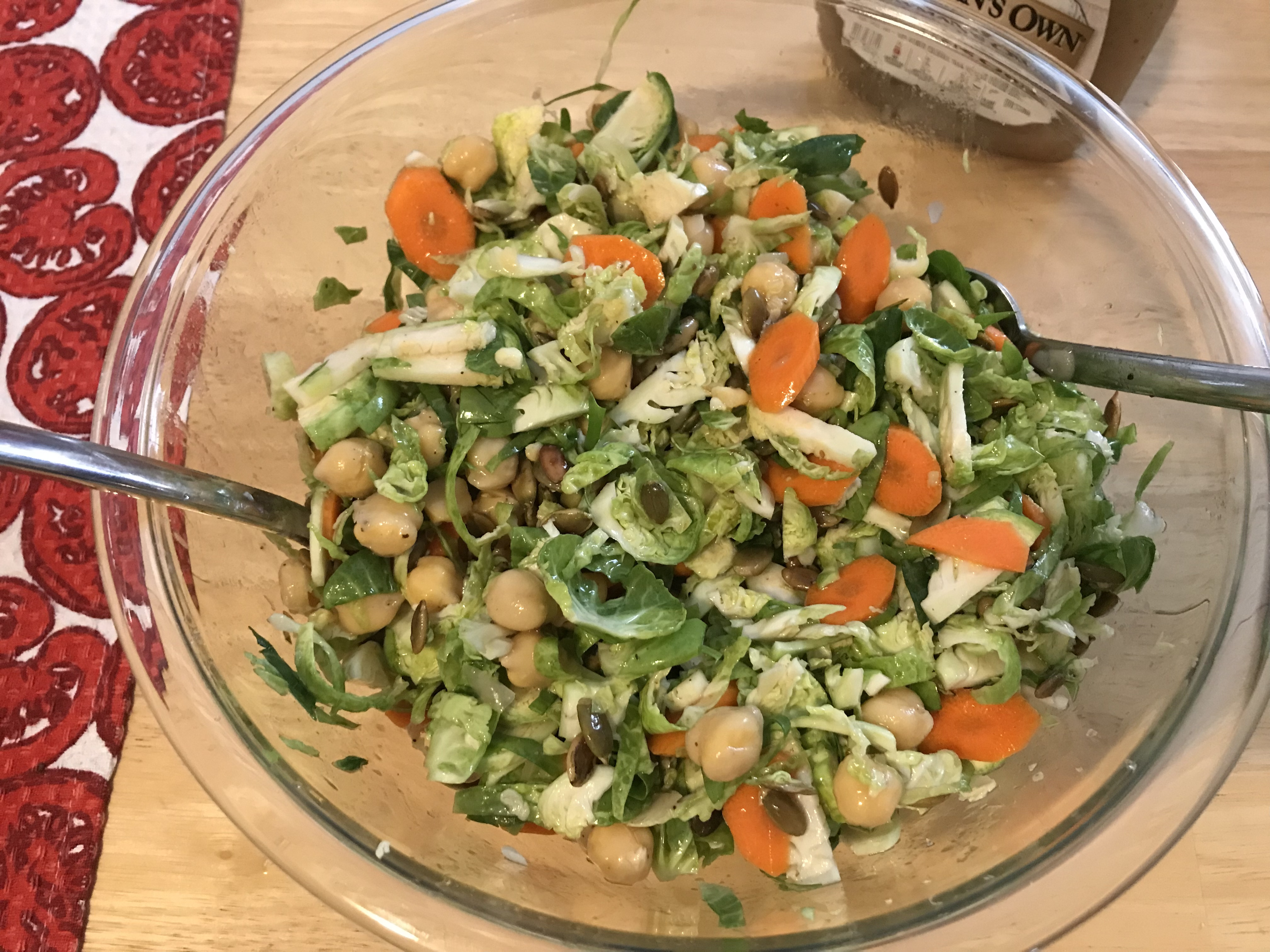 raw brussels sprouts salad with carrots and chickpeas